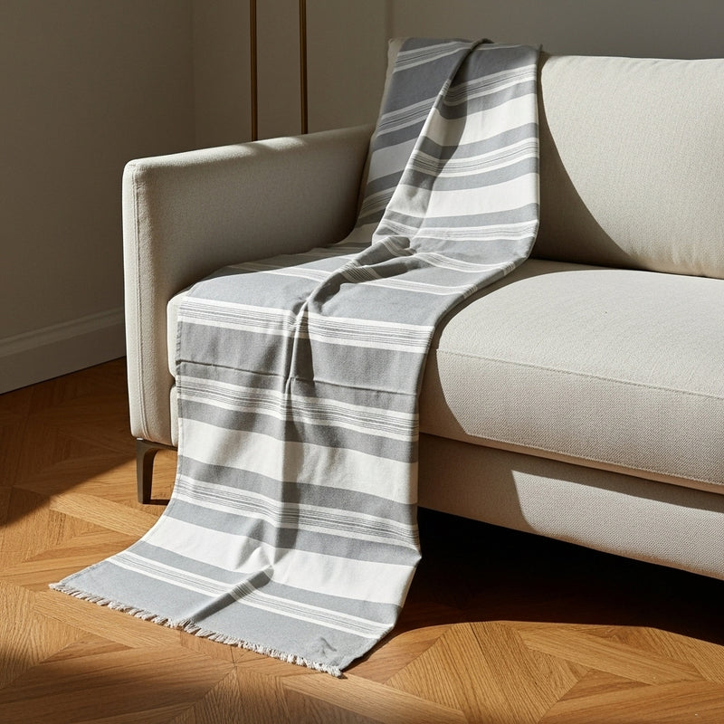 مفرش كنب قُطْنِيّ