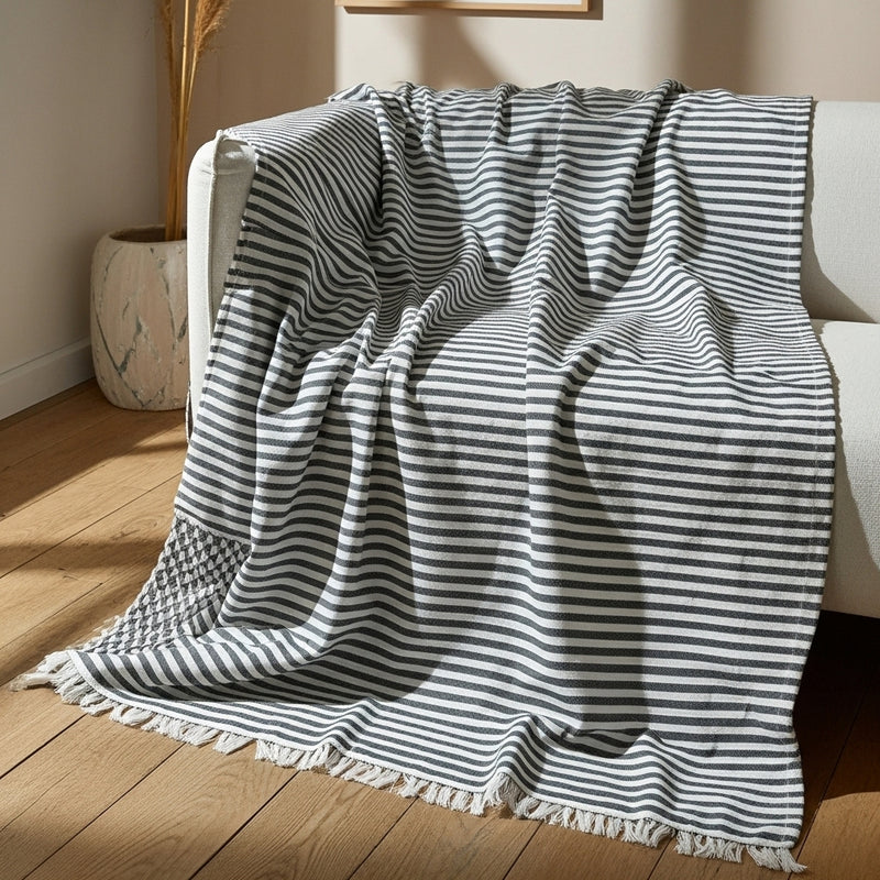 مفرش كنب قُطْنِيّ