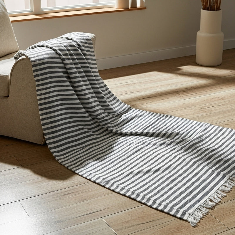 مفرش كنب قُطْنِيّ